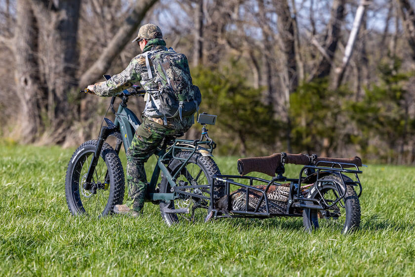 man hunt with electric hunting bike