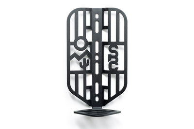 State Bicycle Desert Cargo Cage — front view of matte black laser-cut cage with desert mountain and cactus SBC artwork