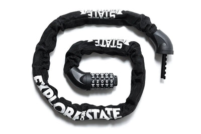 State Bicycle Co. steel chain combo lock overhead view showing coiled chain with Explore Your State sleeve and combination dials