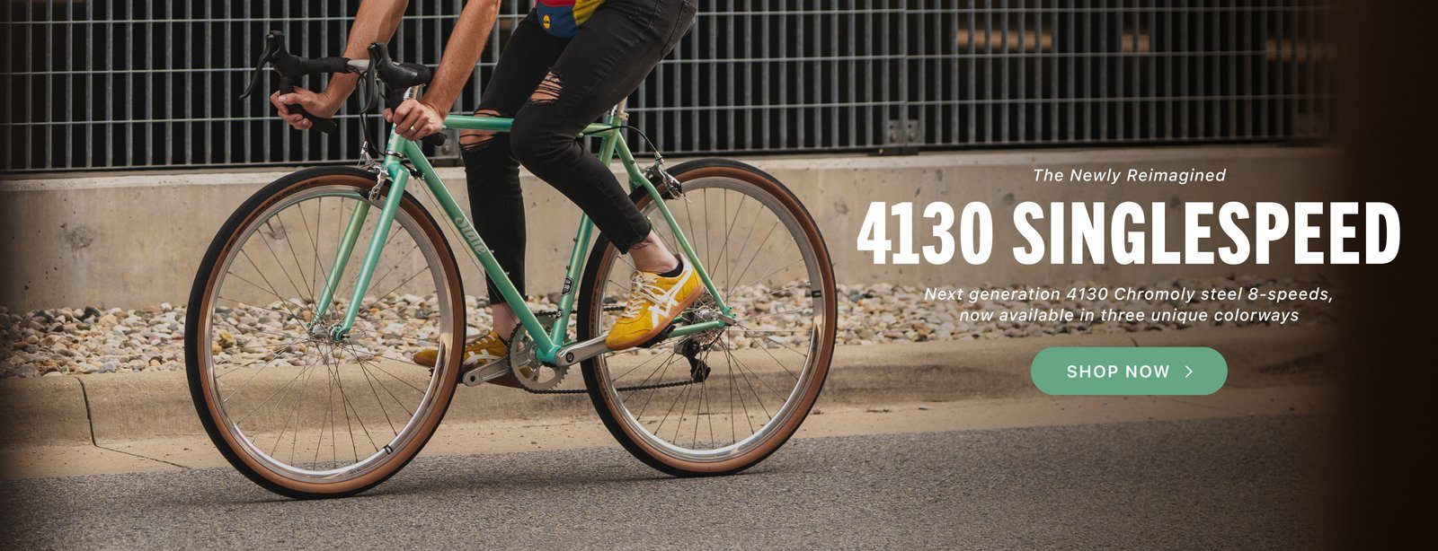 Rider on a State Bicycle Co. 4130 Road in Sea Foam with tan wall tires